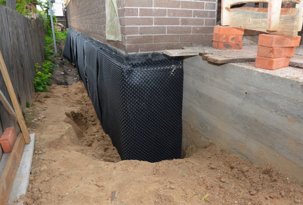 Happy homeowners after waterproofing job in Secaucus
